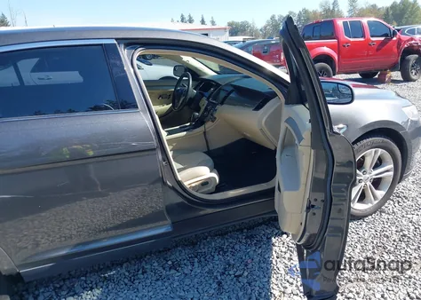 2015 Ford Taurus Sel z USA, uszkodzony, nr VIN 1FAHP2H86FG209432